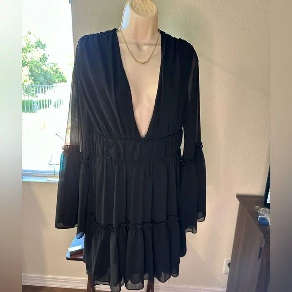 Black Boho dress with a sexy flare. - Picture 1 of 4